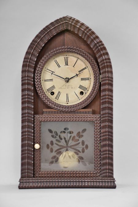 Forestville Manufacturing Co., Bristol, Conn., (J.C. Brown), 8 day, time and strike spring brass movement ripple molding round gothic or beehive shelf clock.