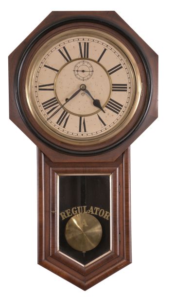 Clocks- 2 (Two): (1) Ansonia Clock Co., New York, "Regulator A" wall clock with a spring driven 8 day time and half hour strike in a black walnut case. c1895. (2) Ansonia Clock Co., New York, "Office Regulator" wall clock with a spring driven 8 day time and half hour strike with seconds bit in a black walnut case. c1895.