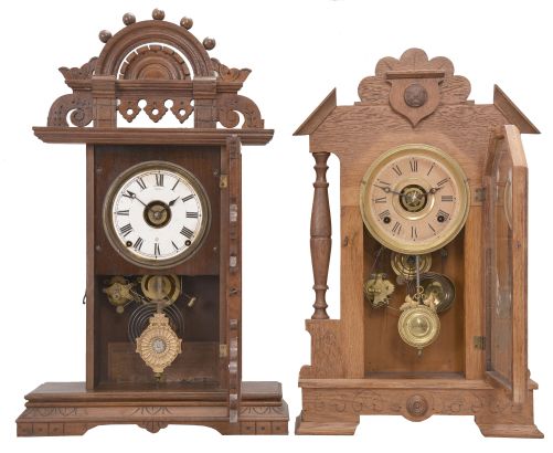 Clocks -2 (Two): (1) Russell & Jones Clock Co., Pittsfield, Mass., "Detroit" shelf clock with a spring driven 8 day time, strike and alarm movement in an oak case. c1890. (2) Seth Thomas Clock Co., Thomaston, Conn., "Eclipse" shelf clock with a spring driven 8 day time, strike and alarm movement (lyre) in a walnut case. c1890.