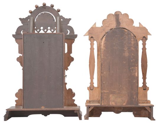 Clocks -2 (Two): (1) Russell & Jones Clock Co., Pittsfield, Mass., "Detroit" shelf clock with a spring driven 8 day time, strike and alarm movement in an oak case. c1890. (2) Seth Thomas Clock Co., Thomaston, Conn., "Eclipse" shelf clock with a spring driven 8 day time, strike and alarm movement (lyre) in a walnut case. c1890.