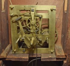 (Attributed to) Sylvester Clarke, Salem Bridge, Conn., 8 day, time and strike weight brass movement flat column with carved crest and feet shelf clock.