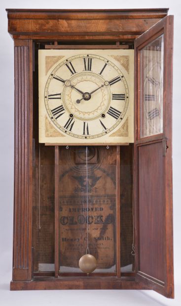 Clocks- 2 (Two): (1) Henry C. Smith, Bristol, Conn., 30 hour, time and strike weight wood movement reeded pilaster and cornice top shelf clock. c1835 (2) Jerome & Darrow, Bristol, Conn. 30 hour, time and strike, weight wood movement column & cornice shelf clock. c1830