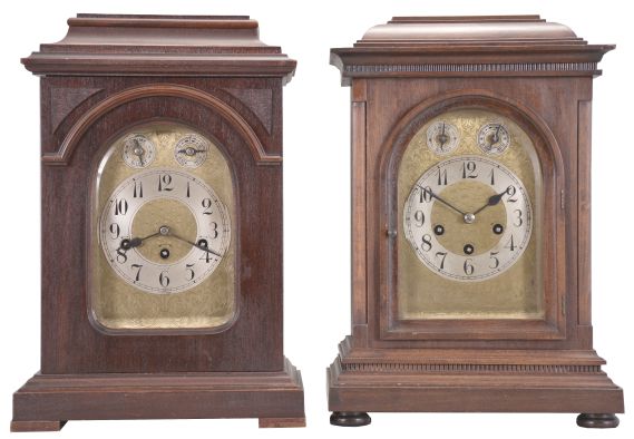 Clocks- 2 (Two): (1) German, 8 day, time, strike and Westminster chime spring brass movement mantel clock. c1910 (2) Junghans, 8 day, time, strike and Westminster chime spring brass movement mantel clock. c1900.