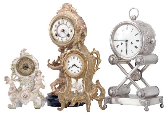 Clocks- 4 (Four): (1) Waterbury Clock Co., Waterbury, Conn., mantel clock, 8 day, time and strike, spring driven movement in a cast metal case featuring a putto holding the clock aloft, cream porcelain dial, 1915; (2) Austria, mantel clock, 2 day, time and strike, spring driven movement in a silver plate-over-copper case with white enamel dial, c1840; (3) Waterbury Clock Co., Waterbury, Conn., novelty clock, 30 hour, time only movement with thread suspension in a cast metal case with painted ceramic panel and topped by putto figure, c1905; (4) Germany, novelty clock, 30 hour, time only, spring driven movement in a porcelain case with putti figures, c1920.