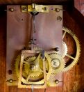 Unknown maker, 8 day, weight brass movement copy of a patent or banjo wall timepiece.