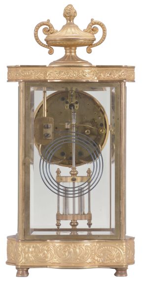 Seth Thomas Clock Co., Thomaston, Conn., "Empire No. 7" crystal regulator, 8 day, time and strike, spring driven movement in a glazed gilt brass case with urn finial, cream porcelain dial and blued steel hands.