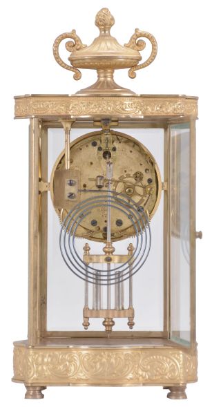 Seth Thomas Clock Co., Thomaston, Conn., "Empire No. 7" crystal regulator, 8 day, time and strike, spring driven movement in a glazed gilt brass case with urn finial, cream porcelain dial and blued steel hands.