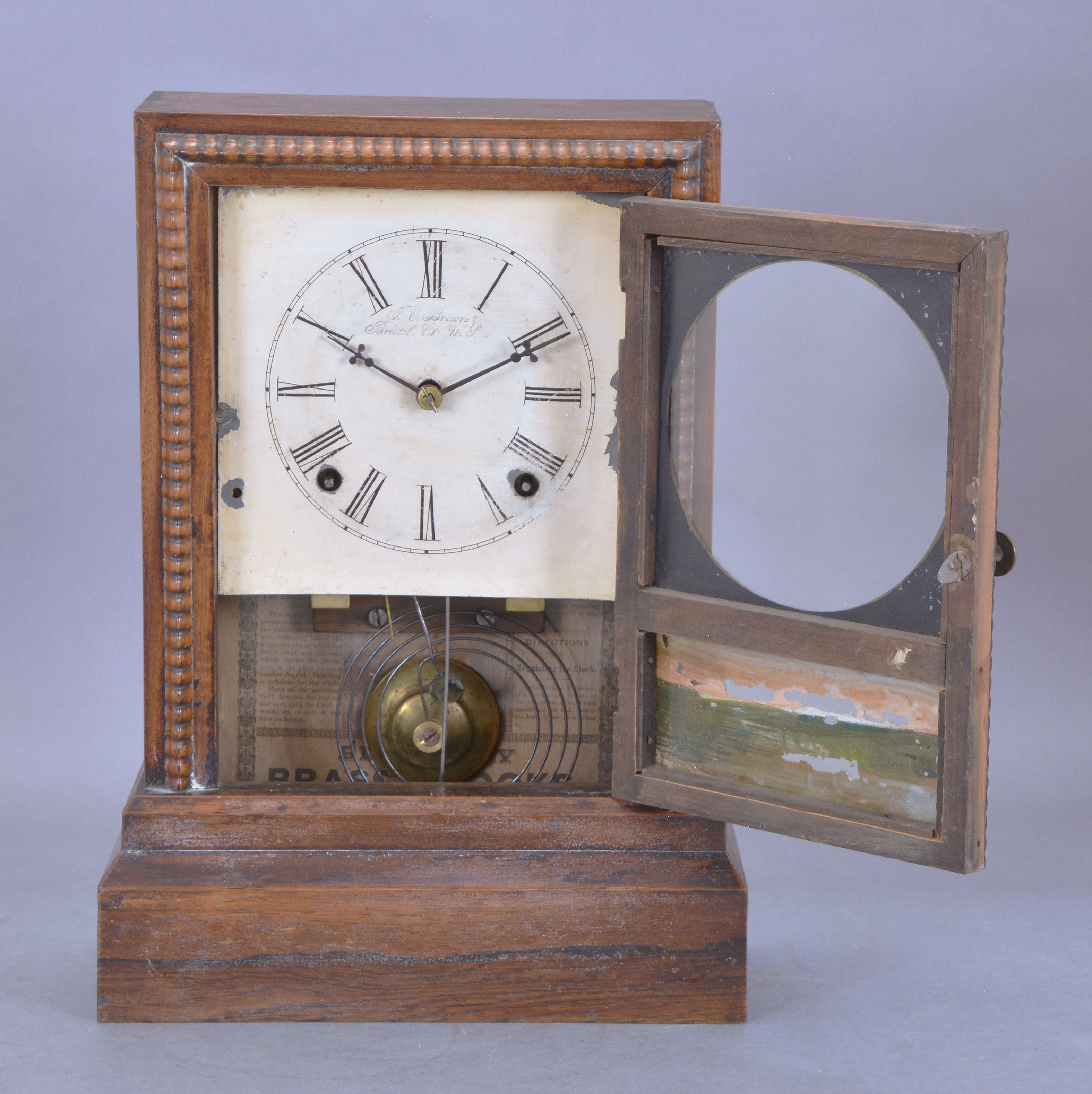 J.C. Brown 8 day time & strike ripple front shelf clock