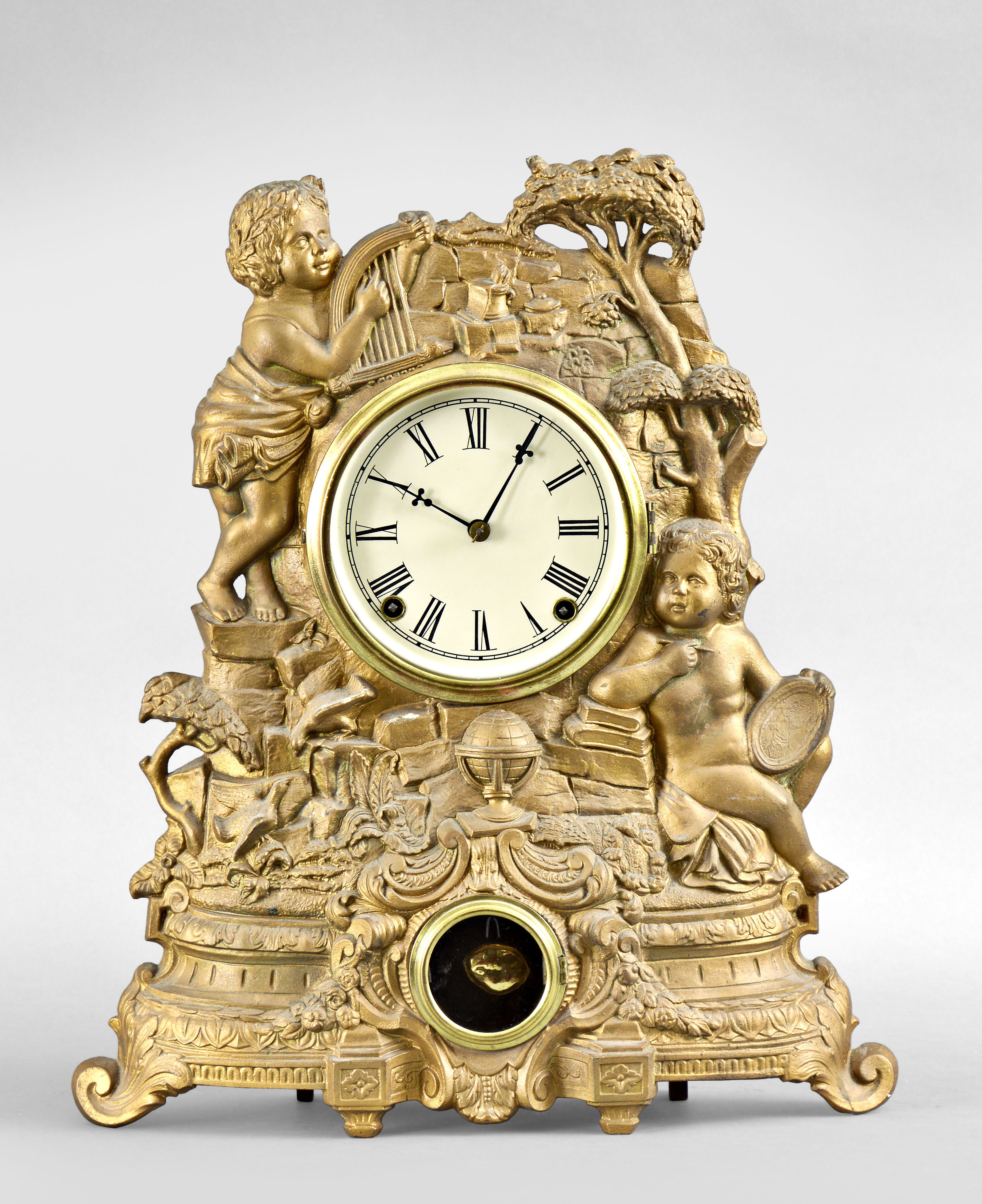 J.C. Brown, New York, 8 day, cast iron front shelf clock.