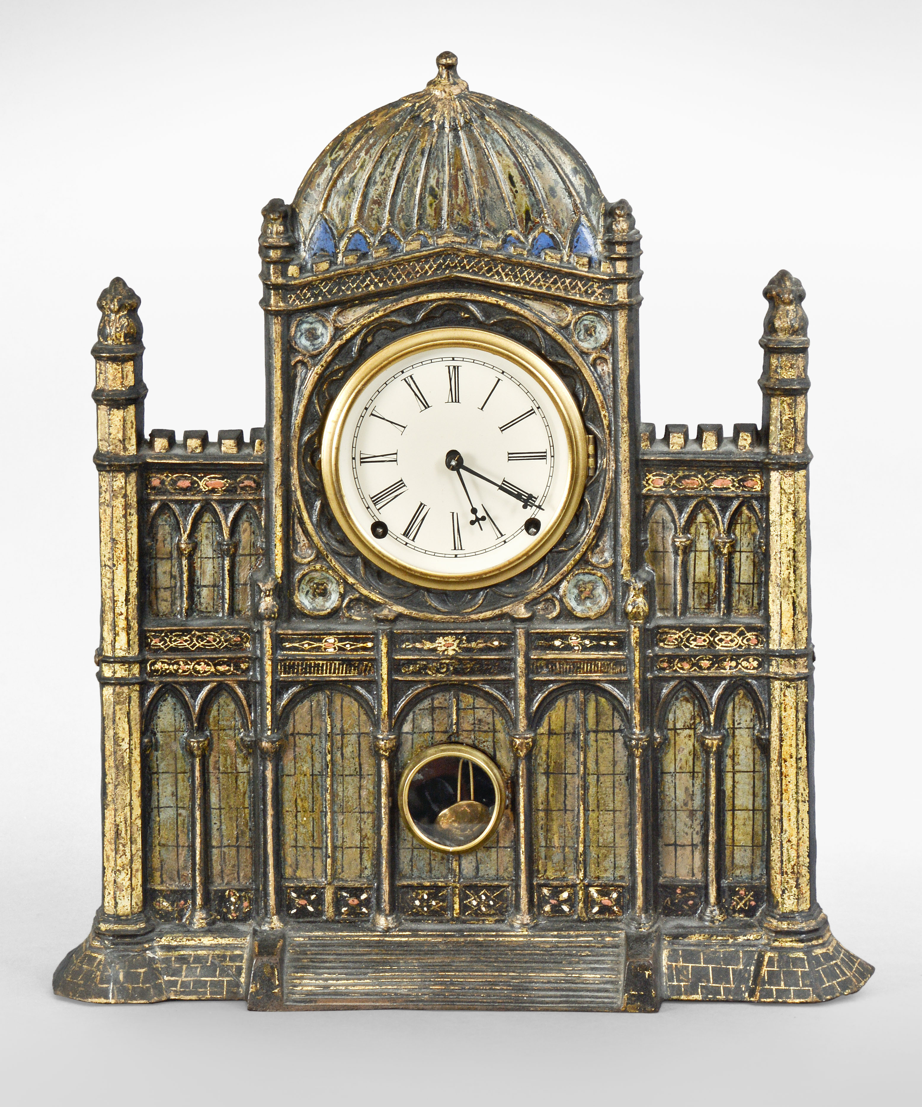 Unusual J.C. Brown cathedral form cast iron shelf clock