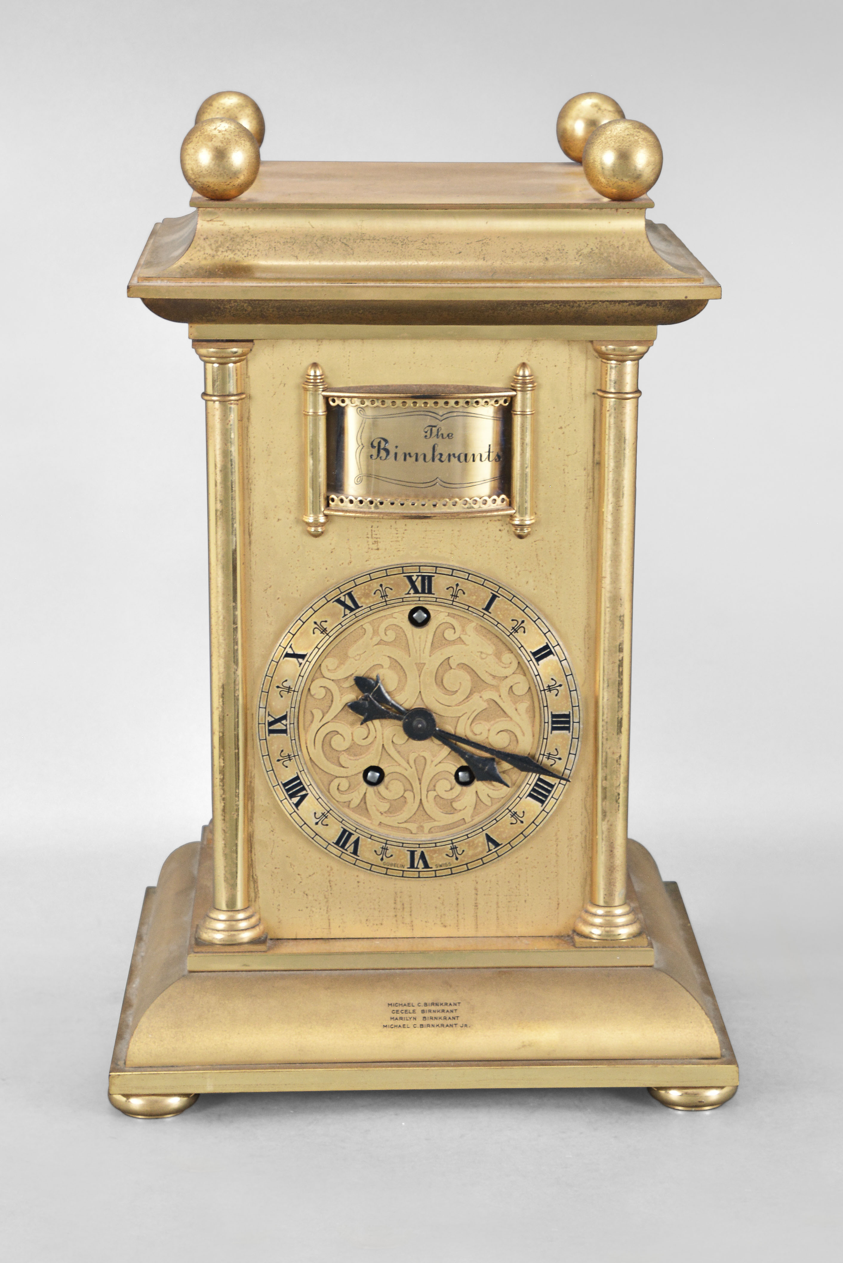 Large table clock with carousel of figures by Gubelin